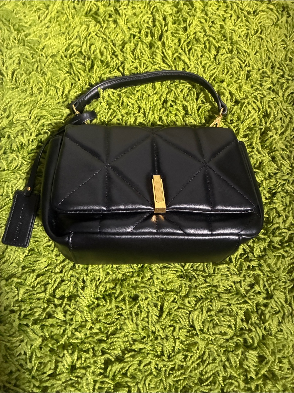 Melie Bianco Black Quilted Crossbody with Gold Accent